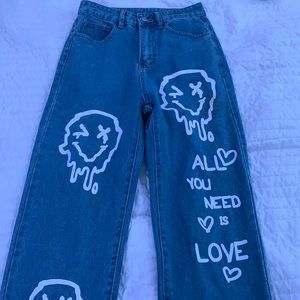 all you need is love - white smiley faces - jeans